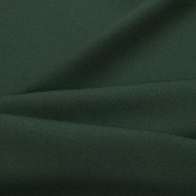 Ткань костюмная 21010 2076, 225 гр/м2, шир.150см, цвет т.зеленый - купить в Великих Луках. Цена 390.73 руб.
